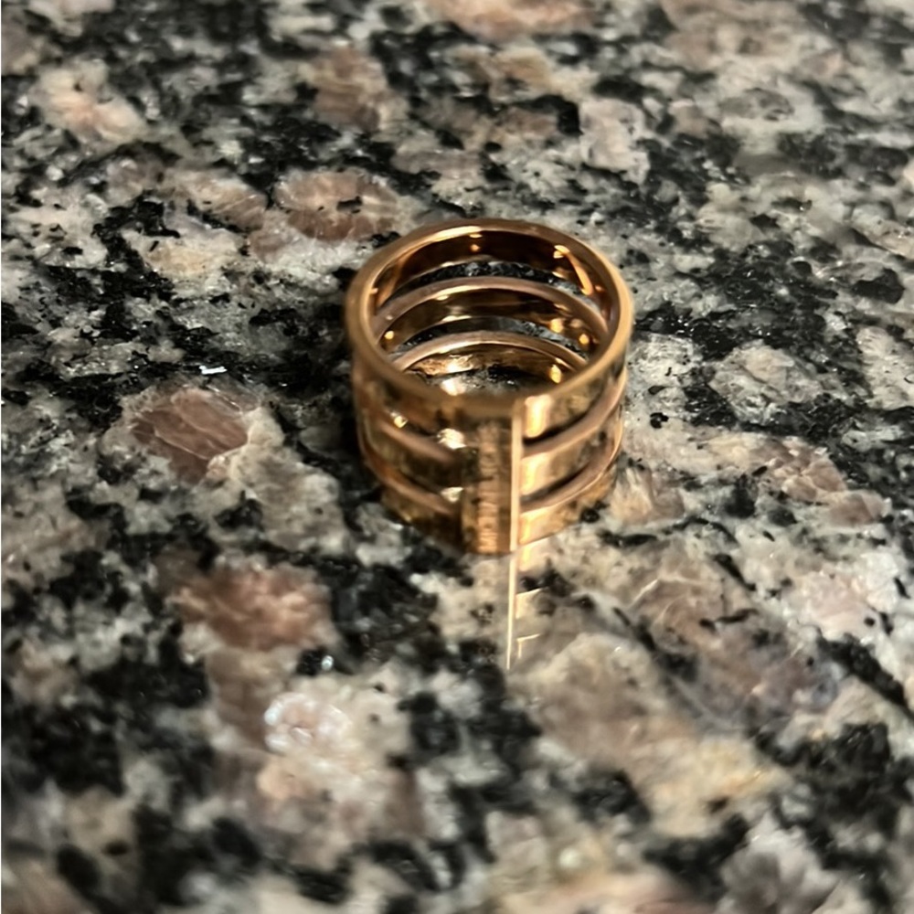 Micheal Kors ring (not sure size, might be a 5) gold